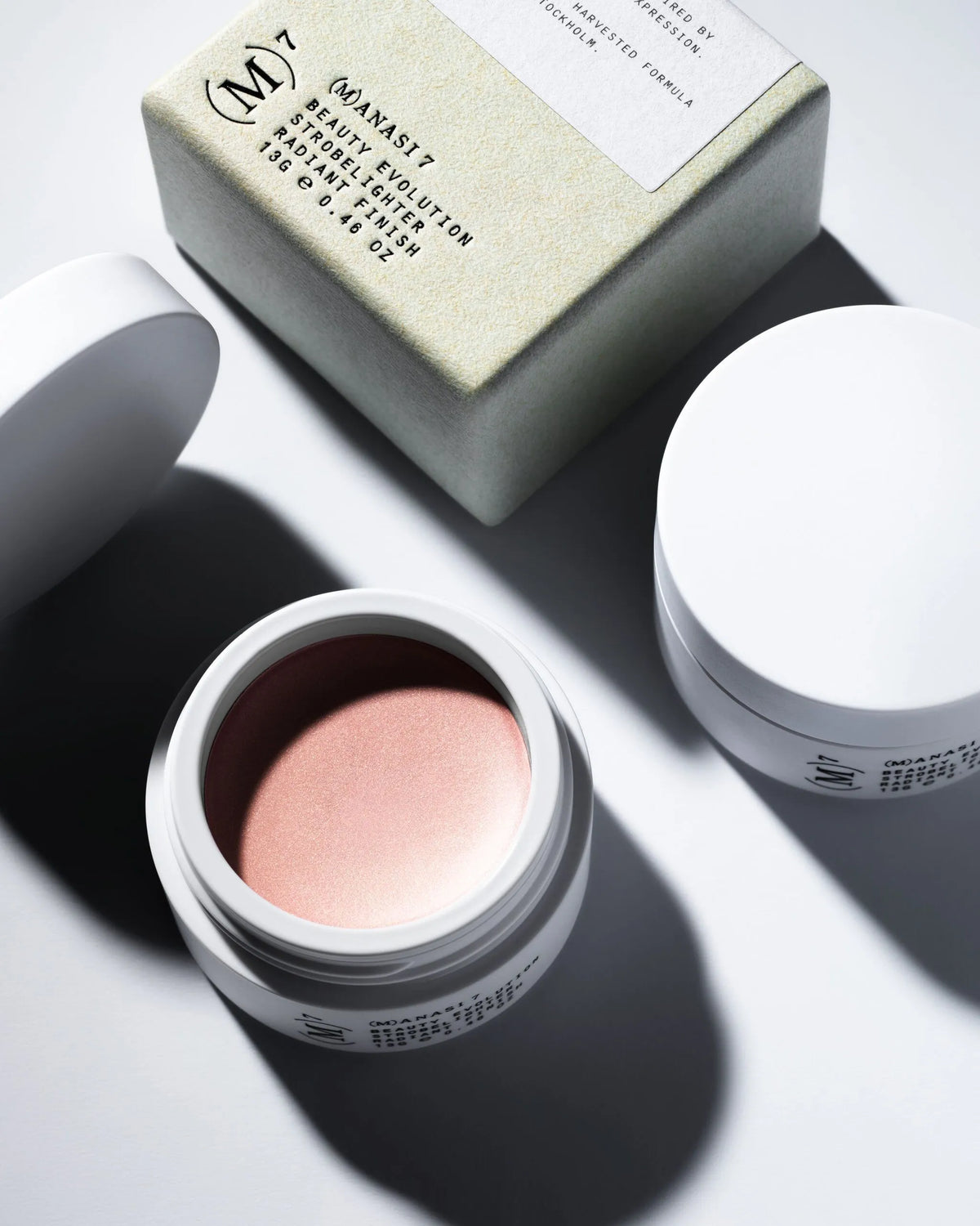 Manasi 7 Strobelighter Sunrise cream highlighter in open jar