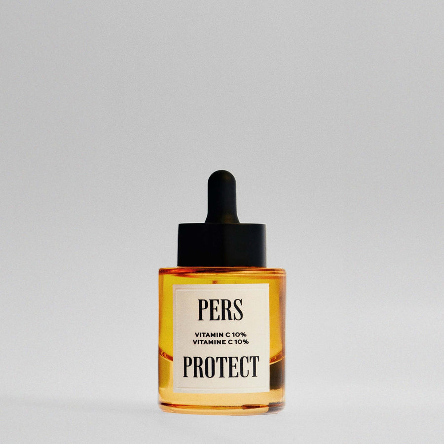 PERS Protect Vitamin C 10% Serum in amber glass bottle with black dropper, showcasing minimalist skincare design with clean typography
