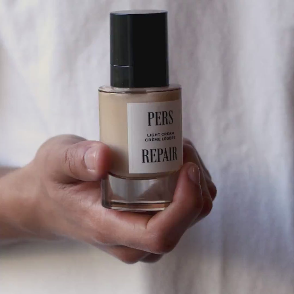 PERS Repair Light Cream being applied in a skincare routine video, demonstrating lightweight texture and gentle moisturizing technique
