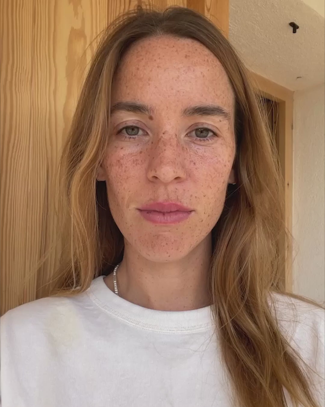 ROWSE Eye Contour Serum being applied in a detailed video demonstration, showcasing precise roll-on technique for targeted eye area treatment