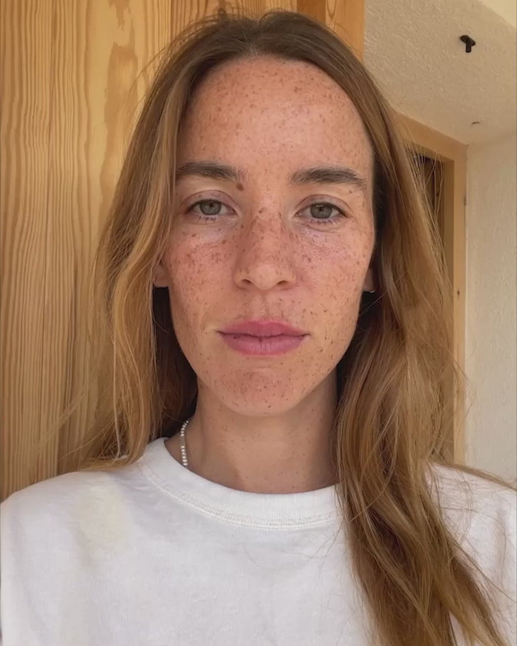 ROWSE Eye Contour Serum being applied in a detailed video demonstration, showcasing precise roll-on technique for targeted eye area treatment