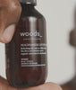 Close-up video demonstration of Woods Copenhagen Niacinamide Lifting Mist spray technique - 5% Vitamin B3 face mist application for instant skin hydration and refresh
