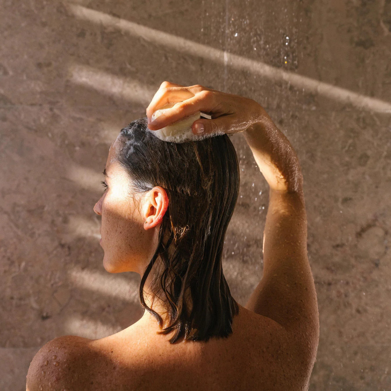 Rowse Perfect Balance shampoo bar lifestyle image - Woman showcasing sustainable hair care, embodying natural beauty and eco-conscious personal care