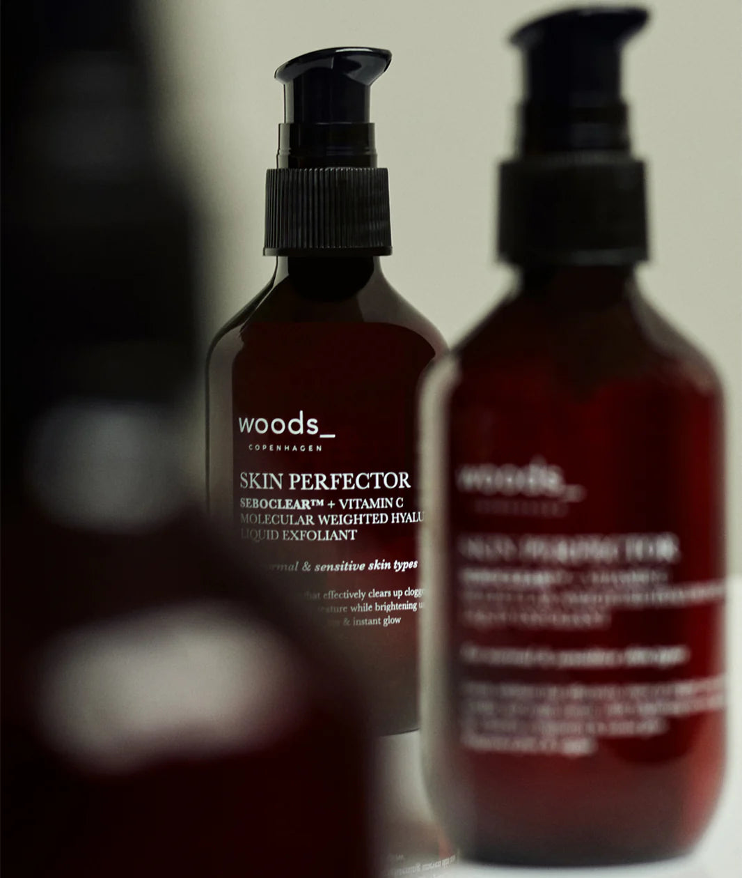 Woods Copenhagen Skin Perfector Seboclear clinical skincare bottle - advanced formula for pore-clearing and skin balancing
