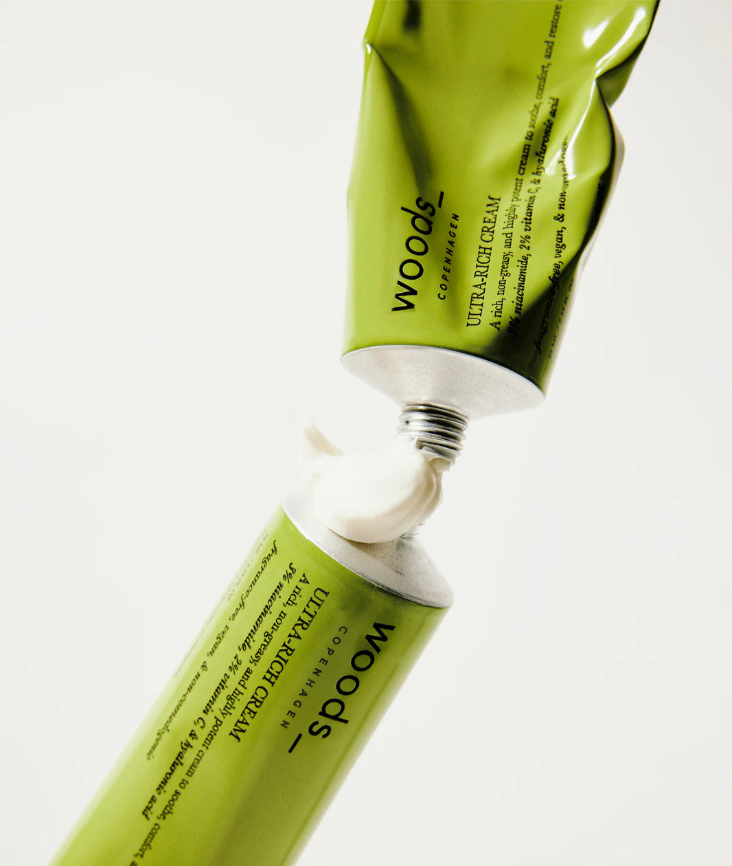 Woods Copenhagen Ultra Rich Cream in vibrant green packaging, showcasing minimalist Scandinavian skincare design with botanical-inspired color palette